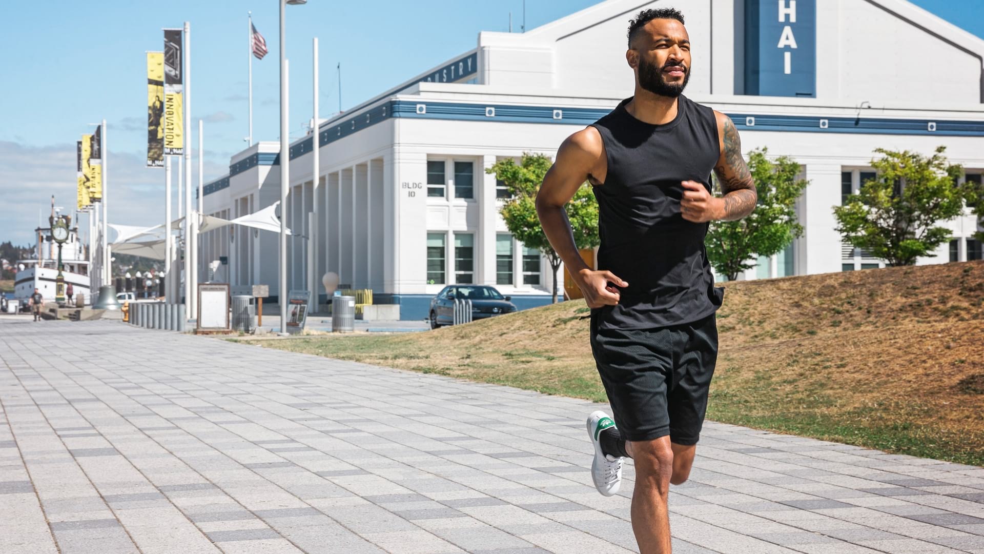 Guy running on a Sunny Day