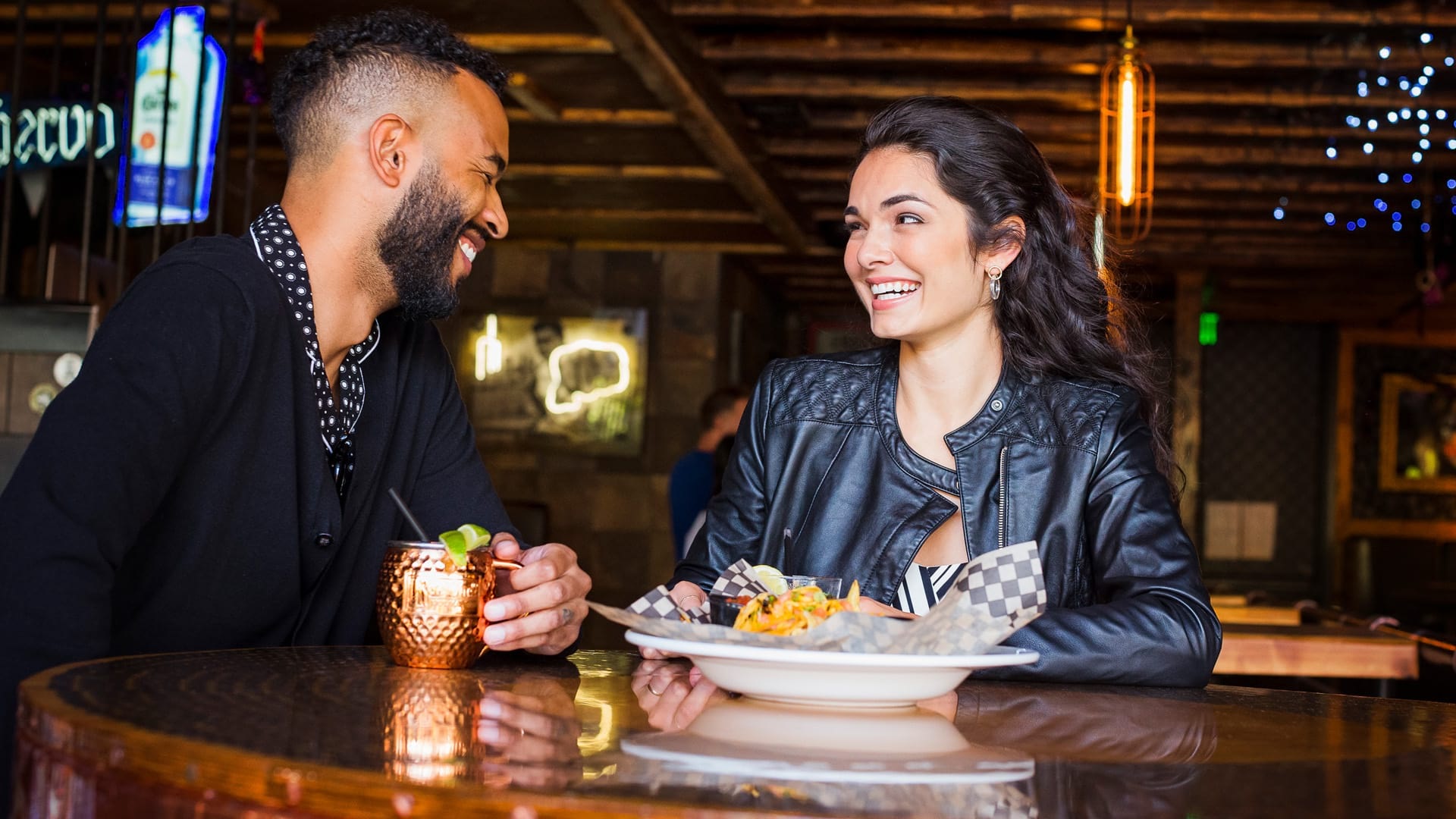 Couple eating at a restaurant in Seattle, WA