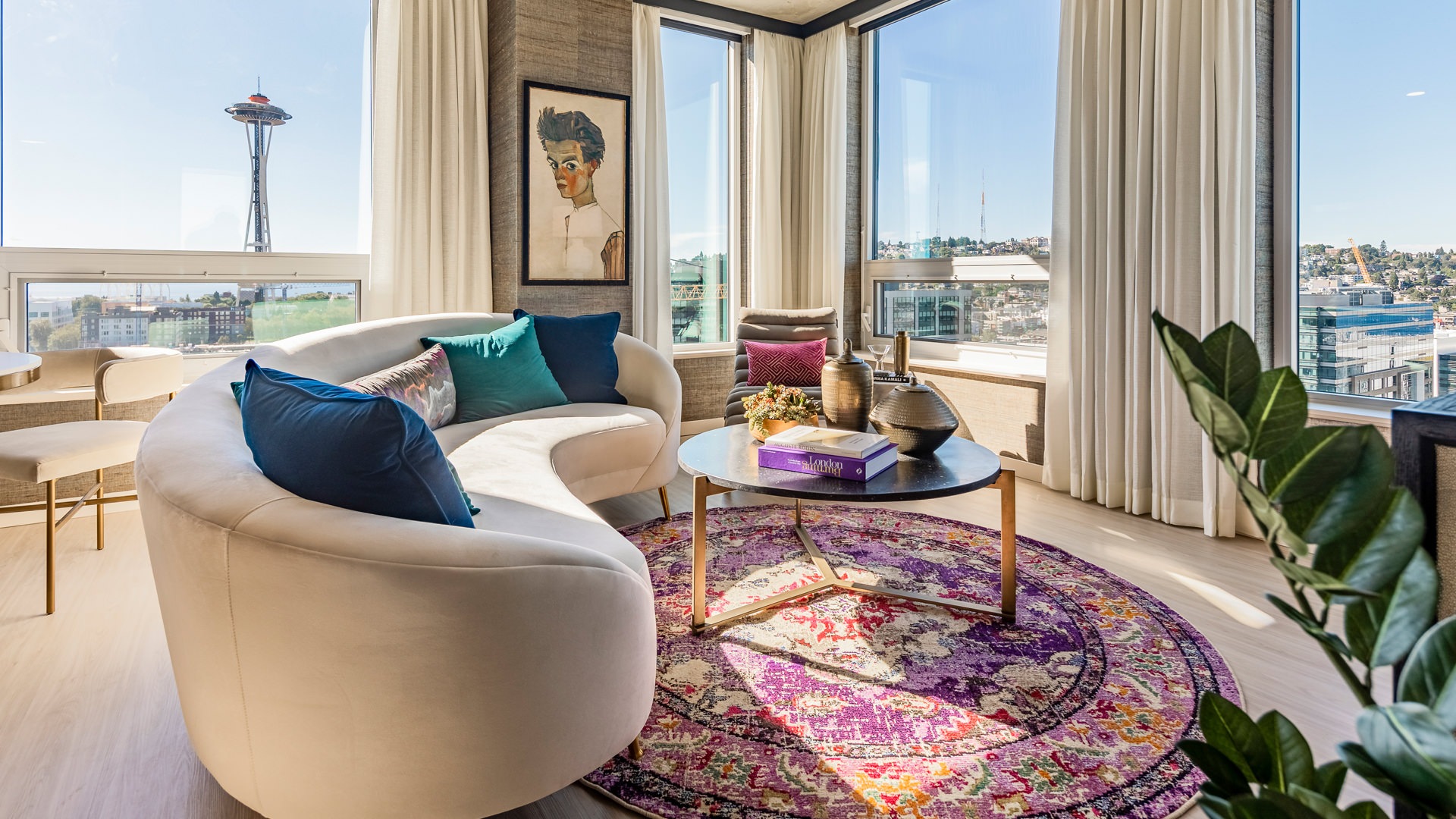 Well-lit living space with a view of Seattle